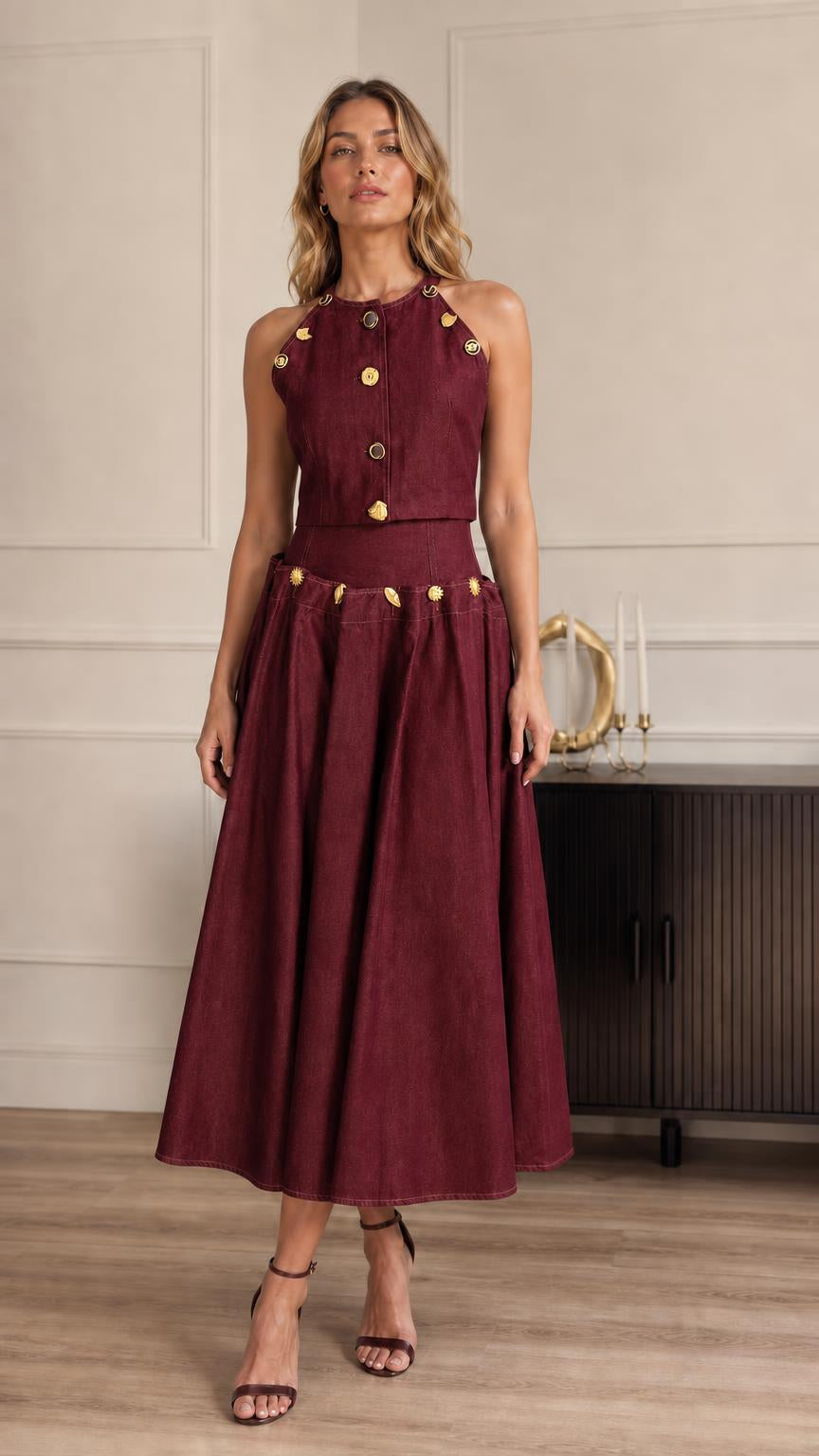 Full-length view of model in burgundy two-piece set