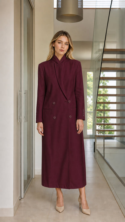 Model wearing deep burgundy wine double-breasted maxi coat dress
