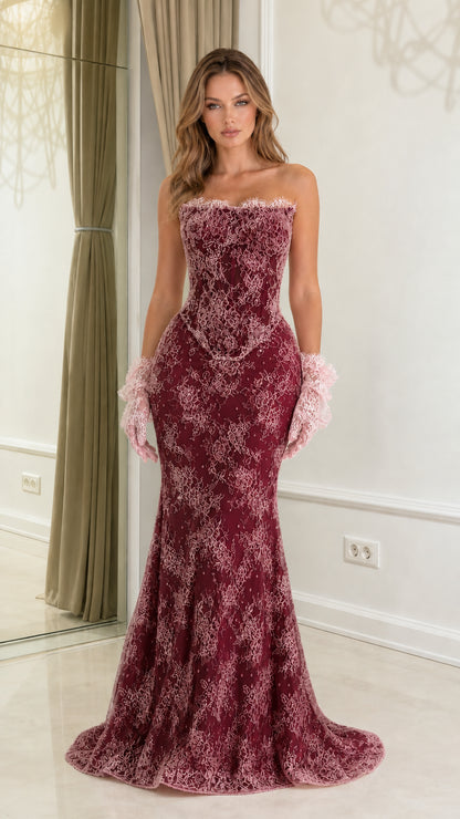 Front view of burgundy strapless lace mermaid evening gown