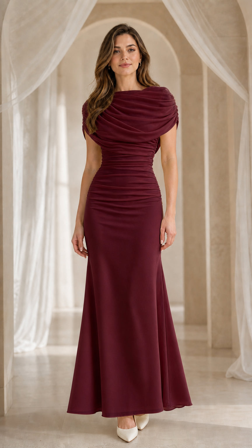 Front view of model in deep burgundy evening gown
