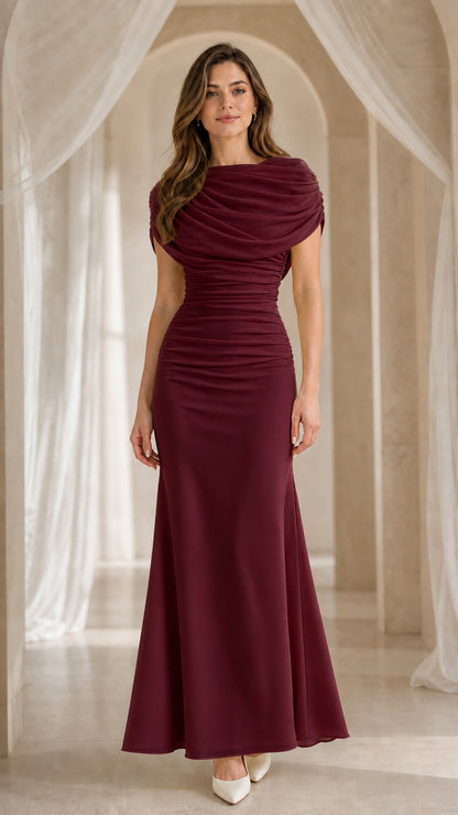 Front view of model in deep burgundy evening gown