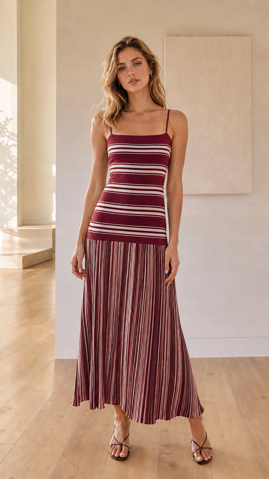 Woman wearing burgundy striped knit maxi dress