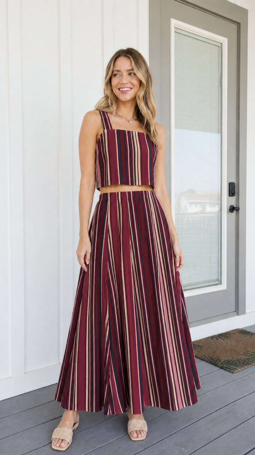 Woman wearing burgundy striped two-piece set