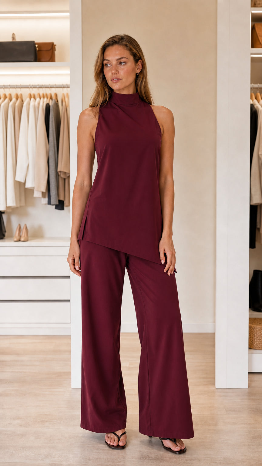 Front view of model in burgundy pant set