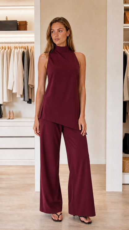 Front view of model in burgundy pant set