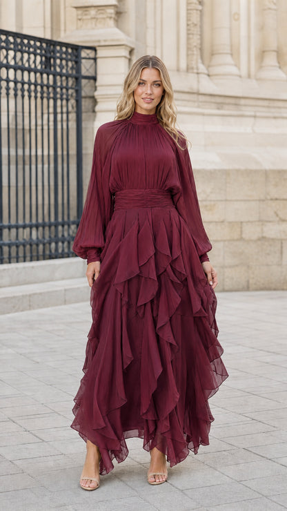 Model wearing burgundy wine tiered ruffle high neck maxi dress