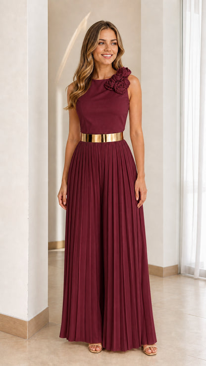 Burgundy pleated wide-leg jumpsuit with floral shoulder applique
