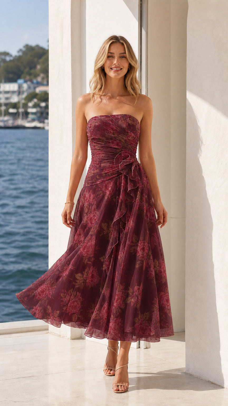 Model wearing burgundy floral strapless midi dress