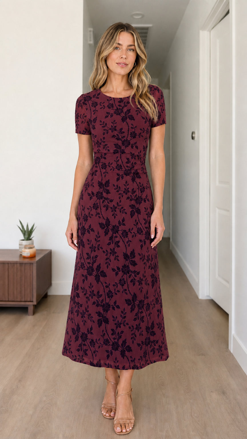 Woman wearing burgundy floral midi dress