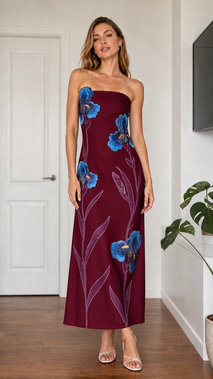 Model wearing burgundy strapless floral embroidered maxi dress