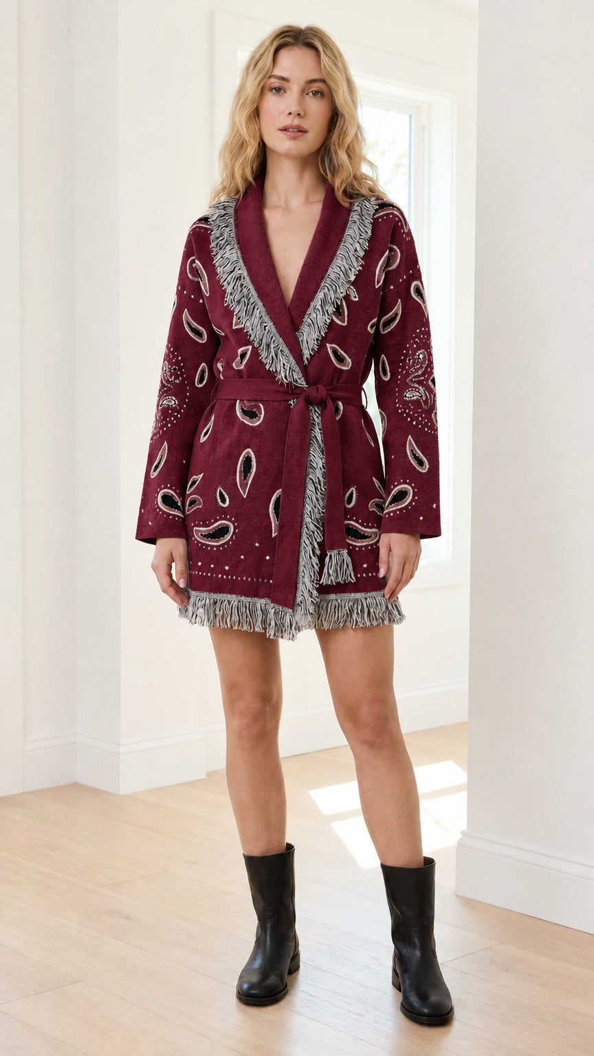 Model wearing burgundy fringe knit cardigan