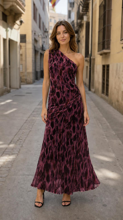 Model wearing burgundy variant of one-shoulder maxi dress