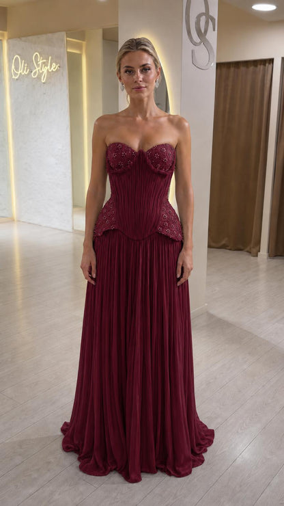 Front view of burgundy strapless corset evening dress variant