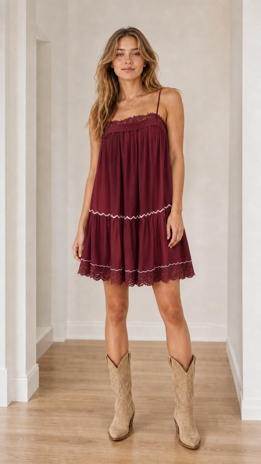 Model wearing burgundy boho mini dress