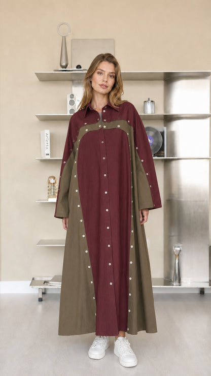 Front view of woman wearing burgundy and olive colorblock maxi shirt dress