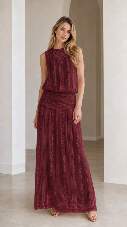 Woman wearing burgundy embroidered maxi dress
