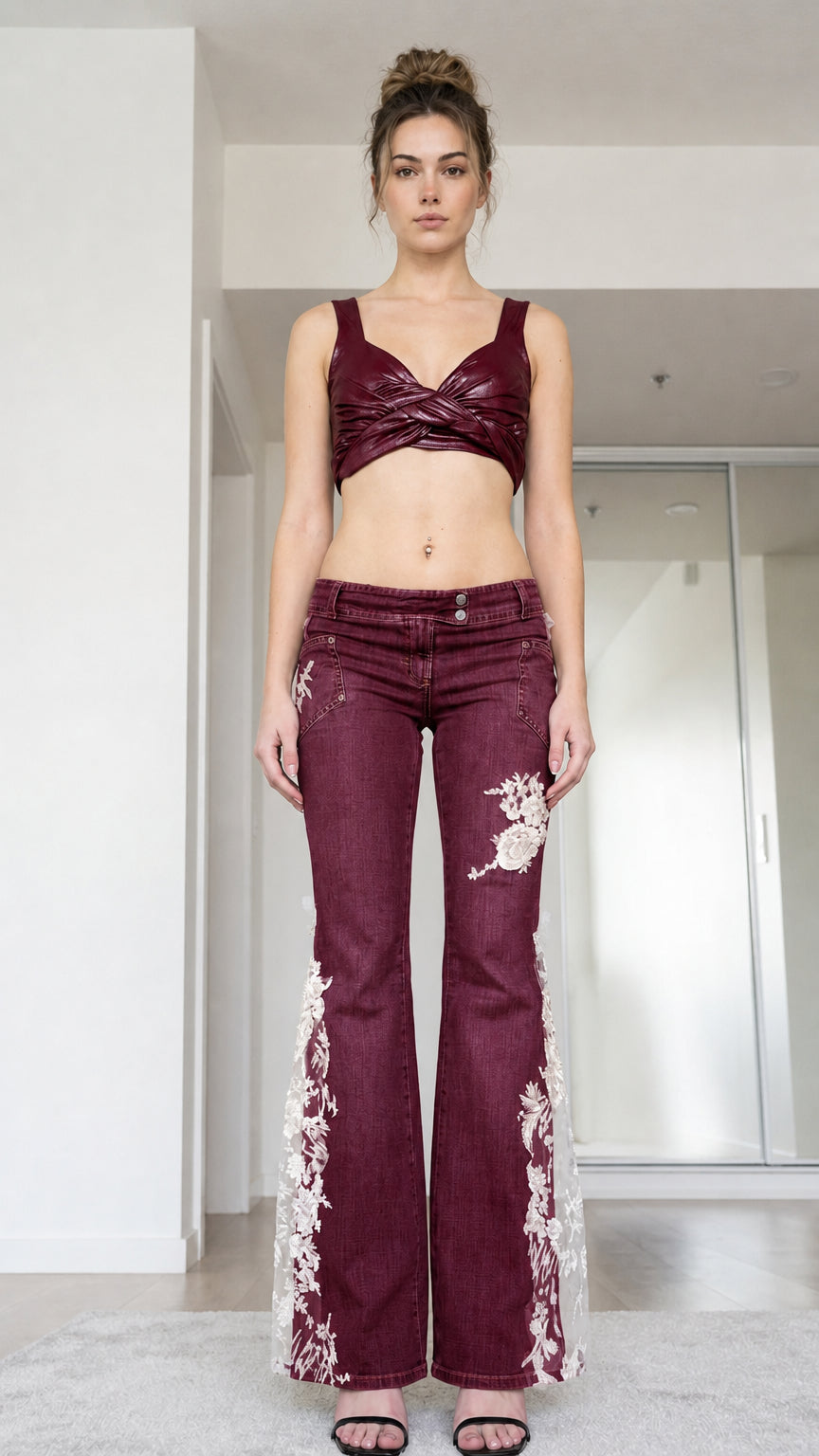 Front view of woman wearing burgundy low-rise lace flare jeans
