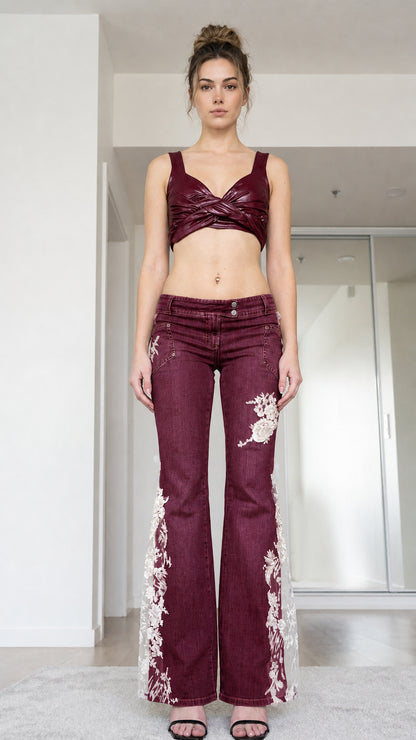 Front view of woman wearing burgundy low-rise lace flare jeans