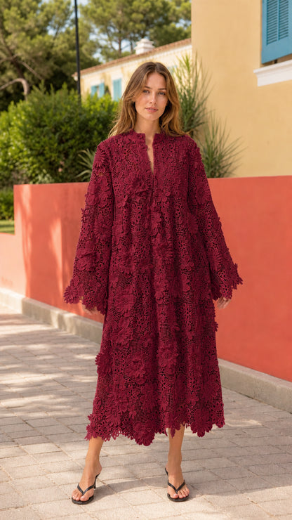 Front view of woman wearing burgundy floral lace midi dress