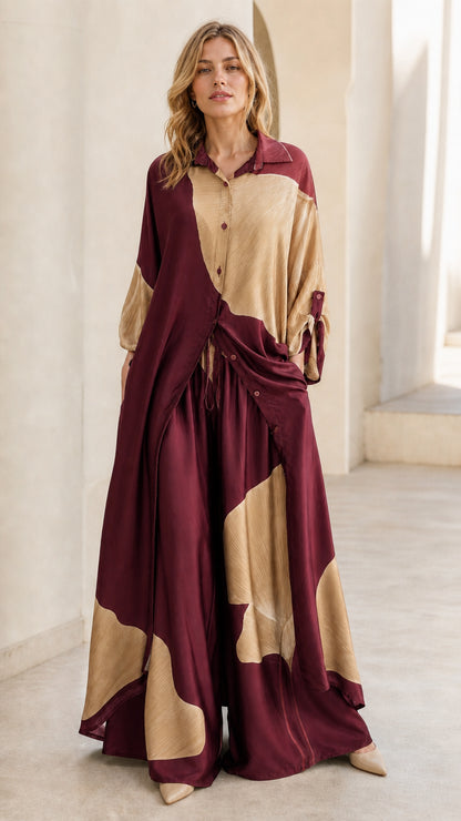Front view of burgundy and beige color block two-piece set