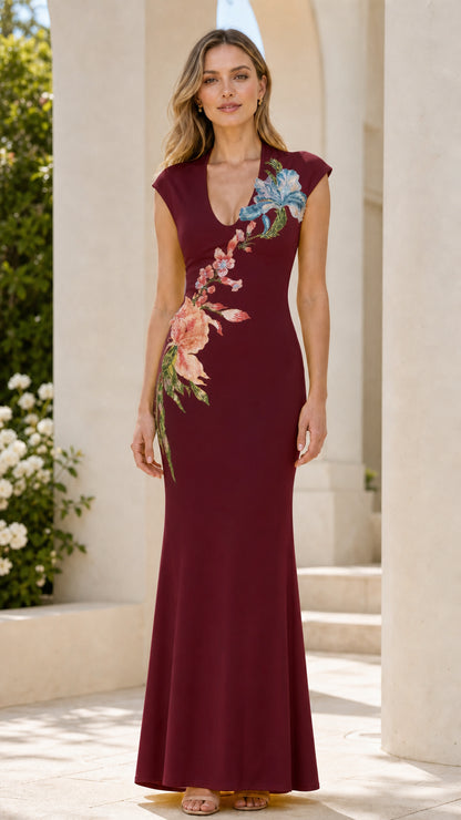 Front view of burgundy floral beaded evening dress