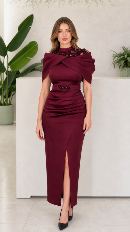 Front view of woman wearing Burgundy beaded illusion neck maxi dress