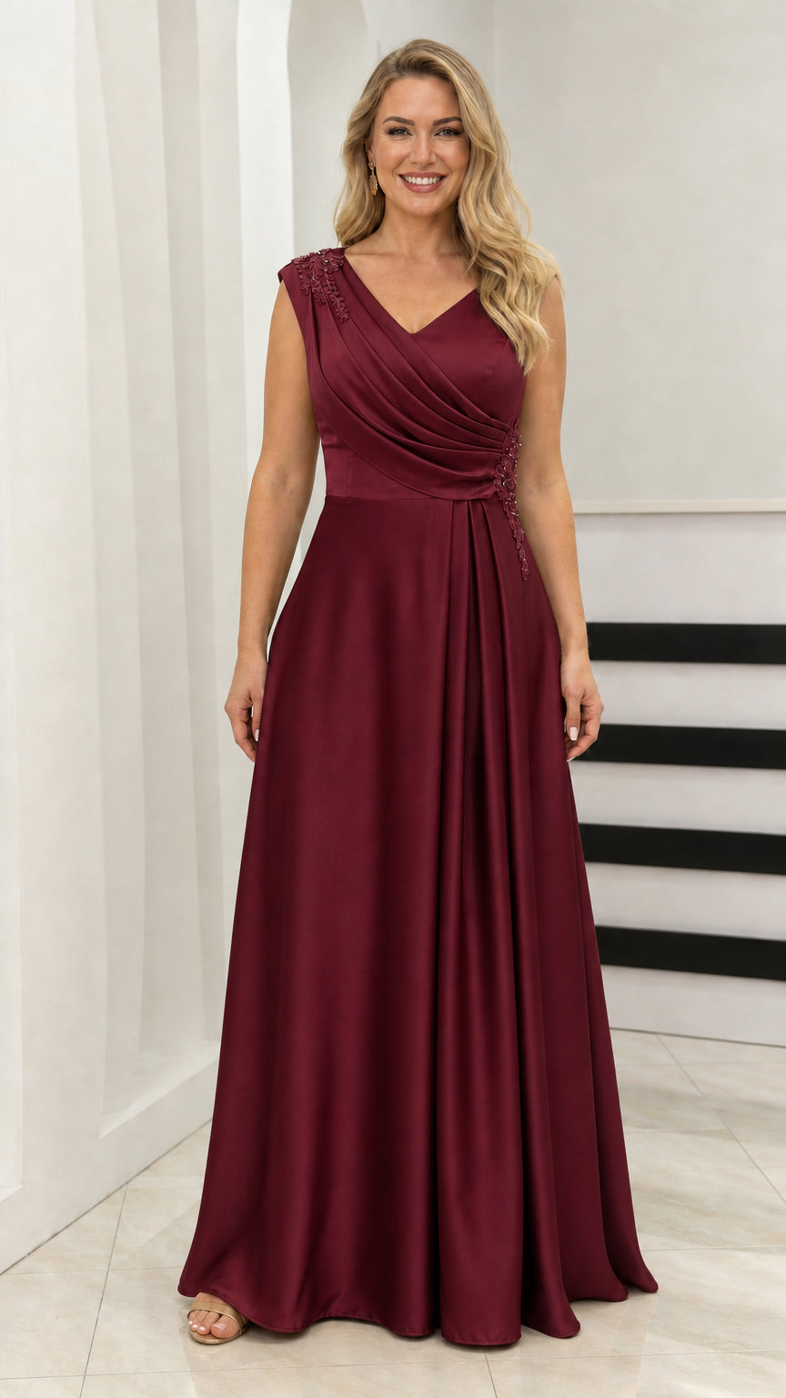 Model wearing burgundy V-neck evening dress
