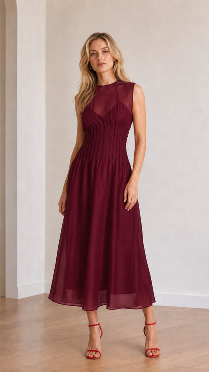 Front view of model wearing burgundy sleeveless midi dress