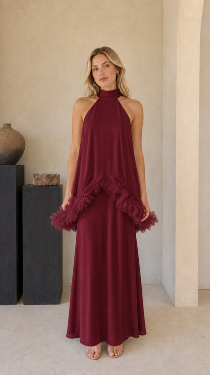 Model wearing burgundy wine high-neck ruffle trim maxi dress