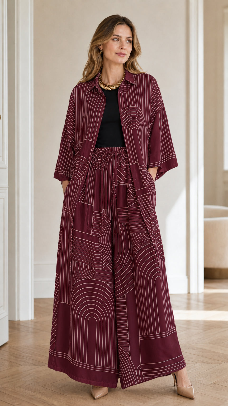 Model wearing burgundy geometric print matching set