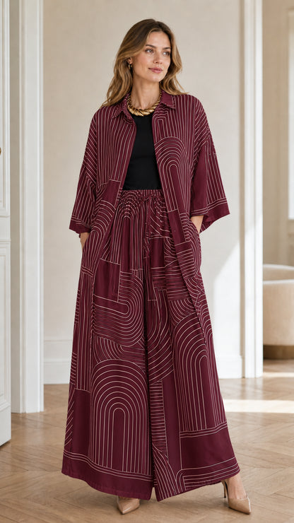 Model wearing burgundy geometric print matching set