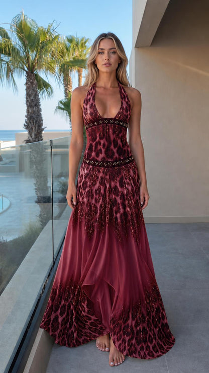 Front view of woman wearing burgundy ombre leopard print maxi dress