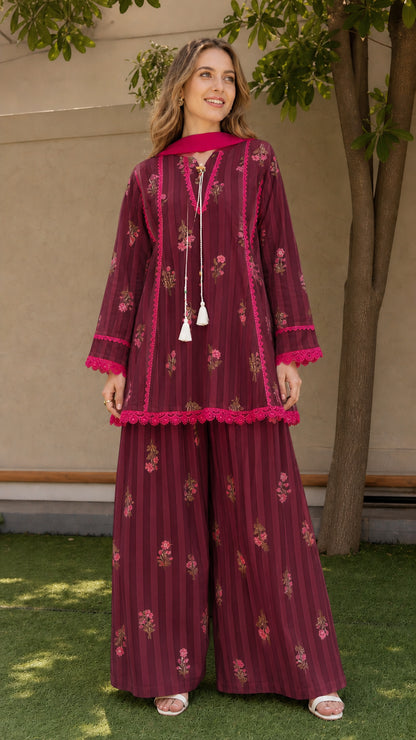 Woman wearing burgundy variant of striped floral kurti and palazzo set
