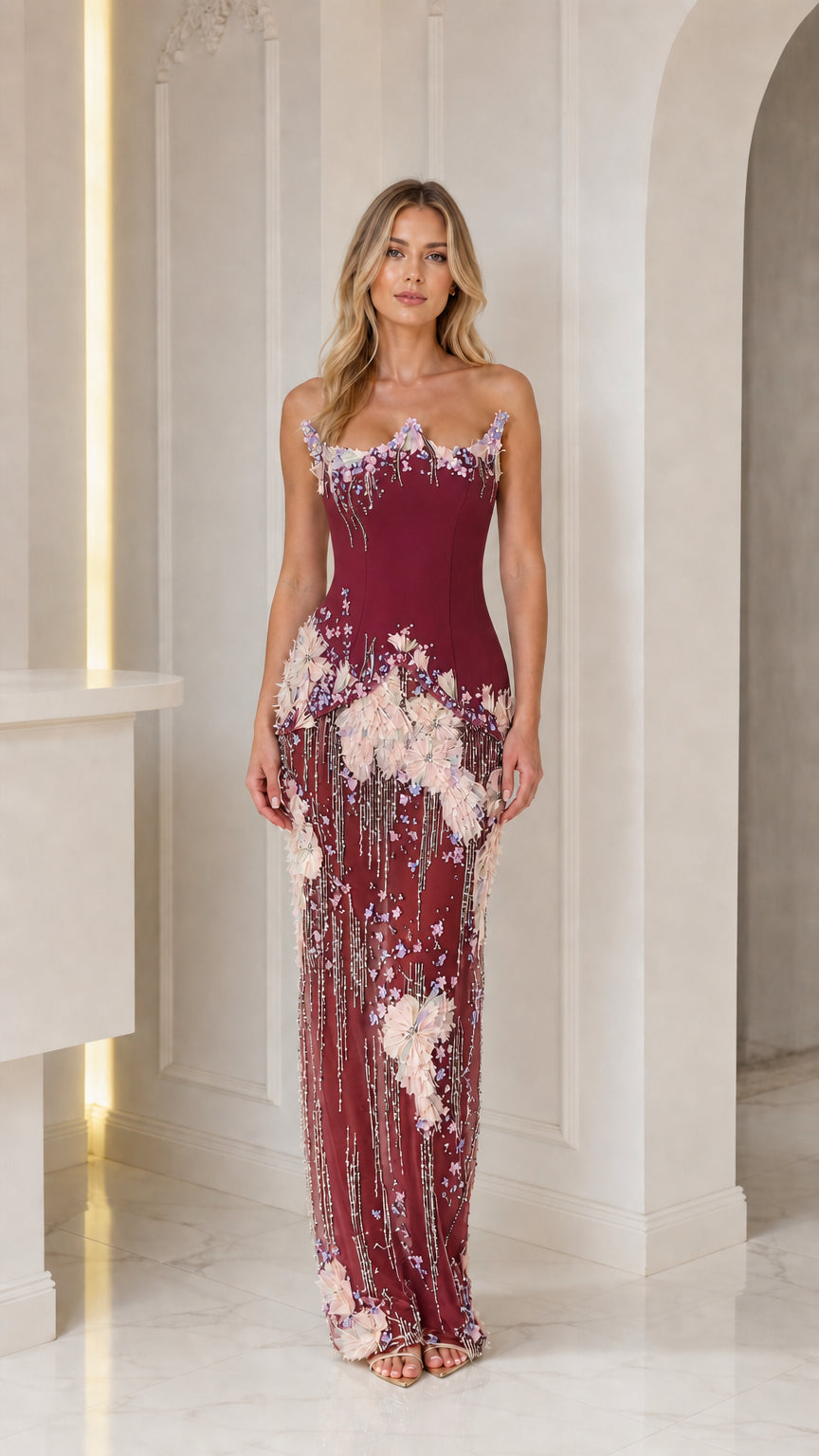 Front view of burgundy embellished strapless gown