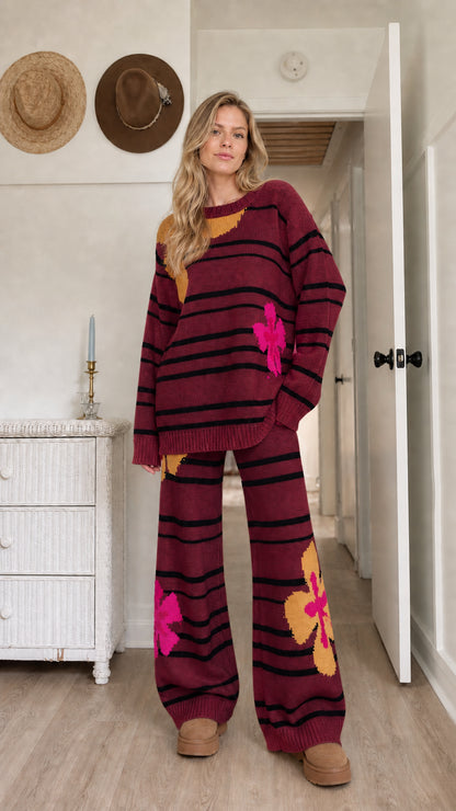 Model wearing burgundy wine red striped knit matching lounge set