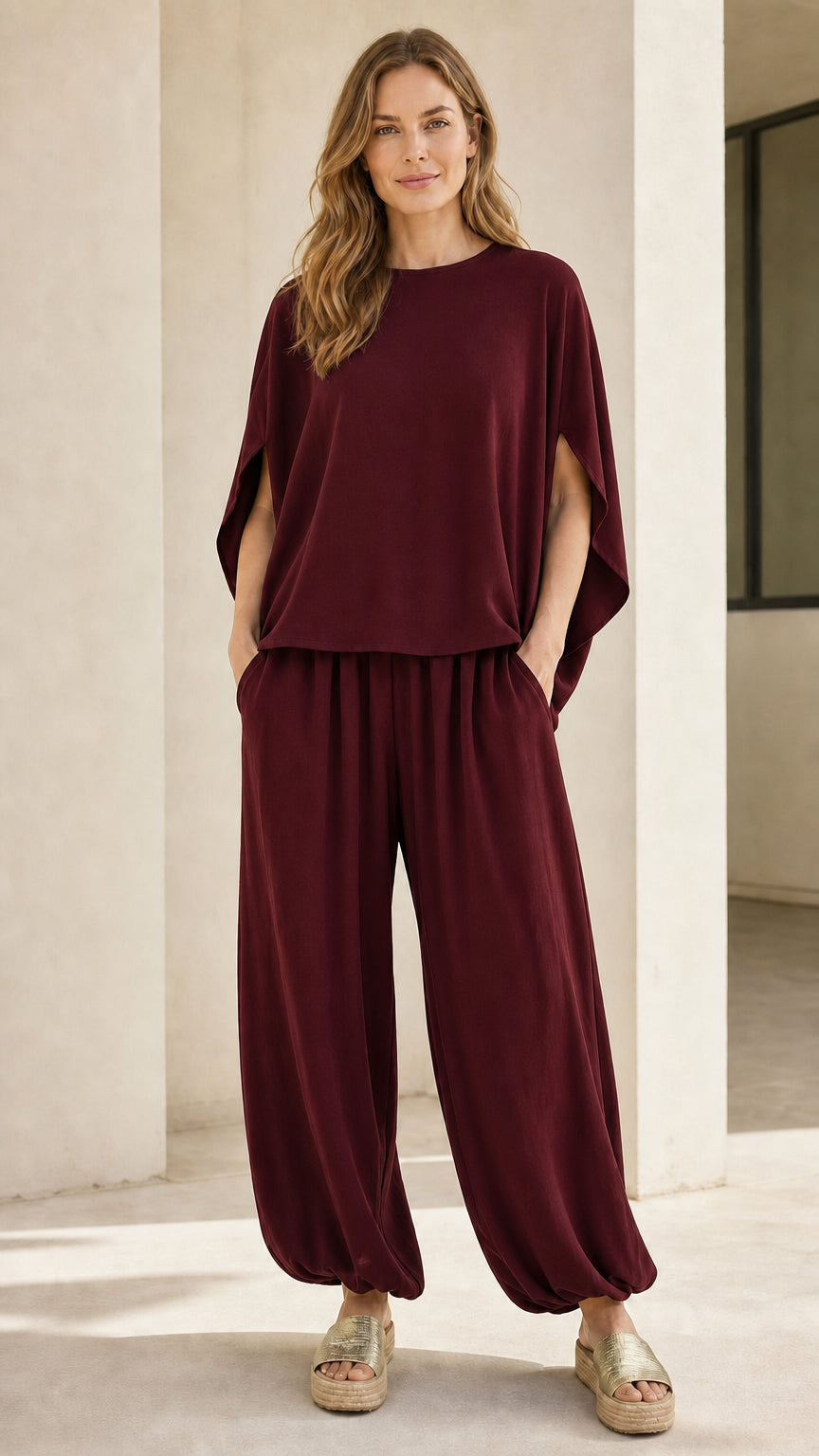 Woman wearing burgundy matching two-piece lounge set