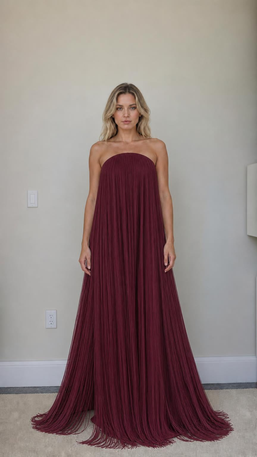 Front view of burgundy strapless fringe maxi dress