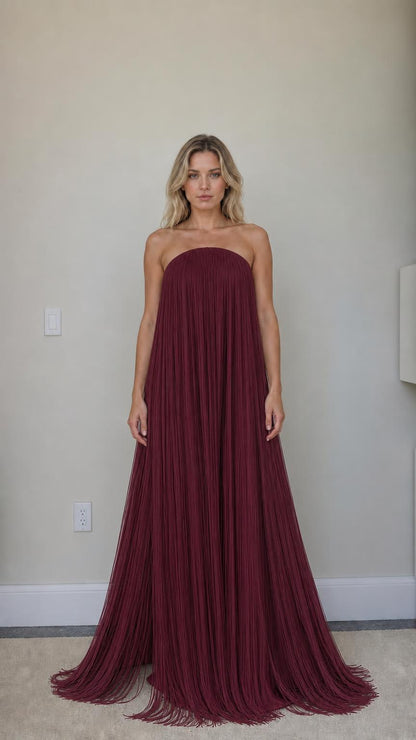 Front view of burgundy strapless fringe maxi dress
