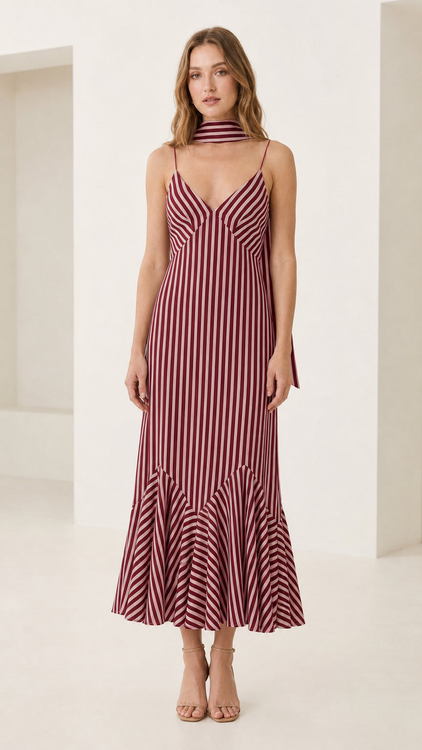 Front view of model in burgundy striped cami maxi dress