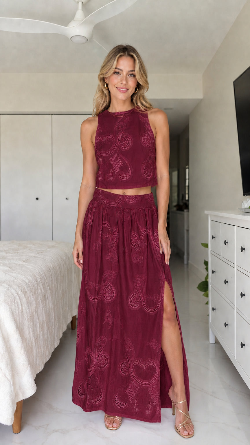 Front view of model wearing burgundy two-piece set
