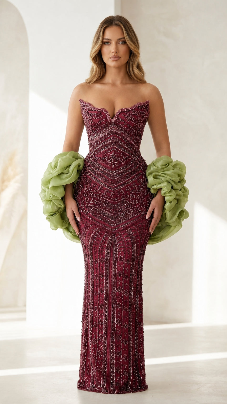 Front view of burgundy beaded evening gown