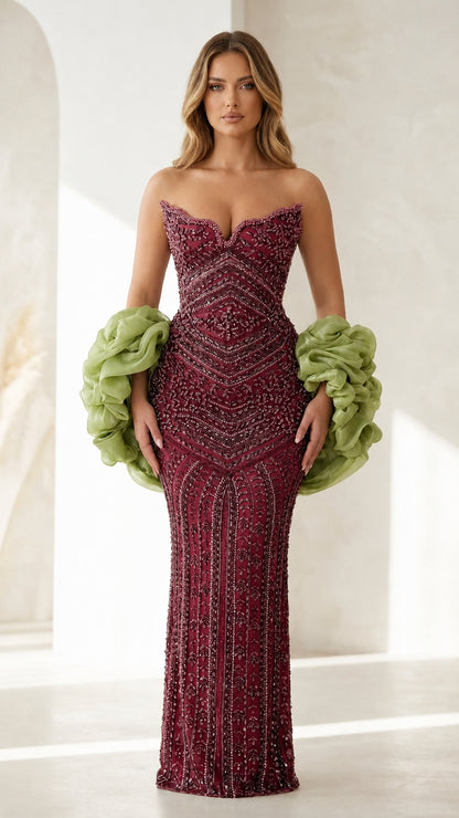 Front view of burgundy beaded evening gown