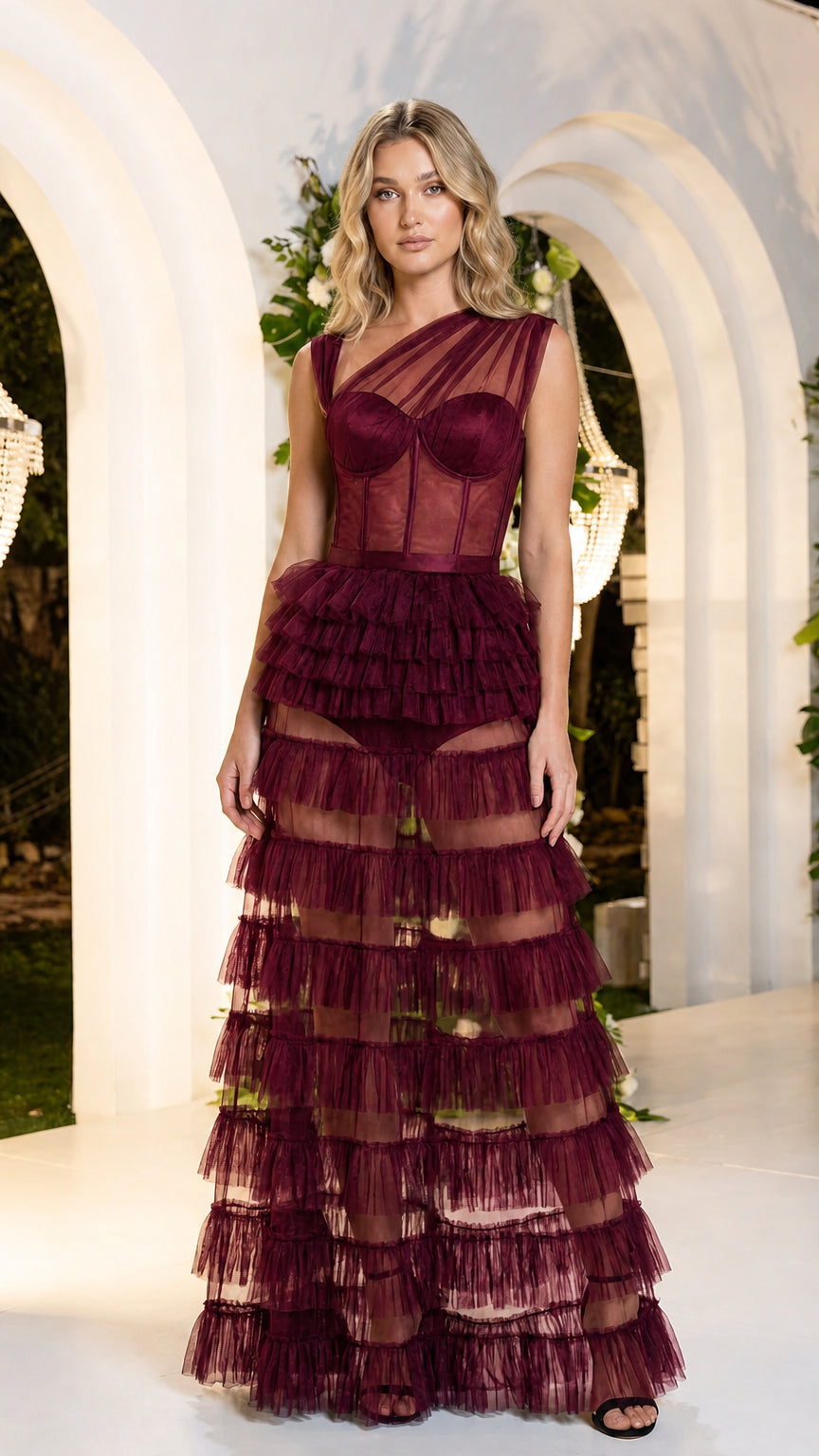 Front view of burgundy wine one-shoulder corset tiered ruffle formal gown