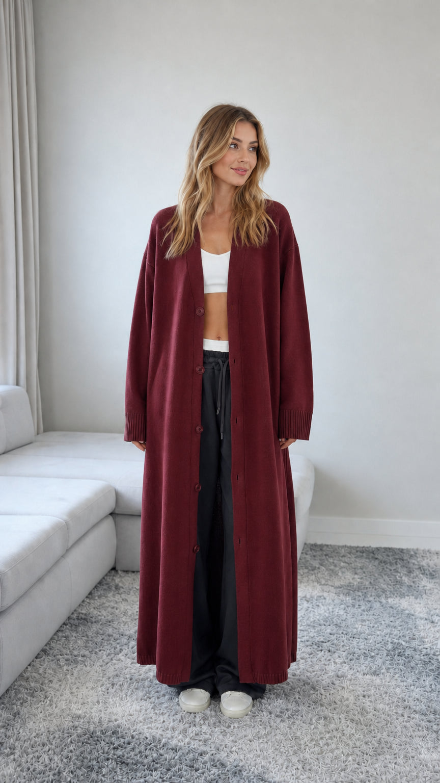 Front view of model wearing a Burgundy red floor length maxi duster cardigan