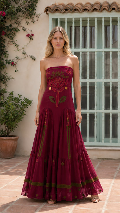 Front view of burgundy strapless embroidered maxi dress