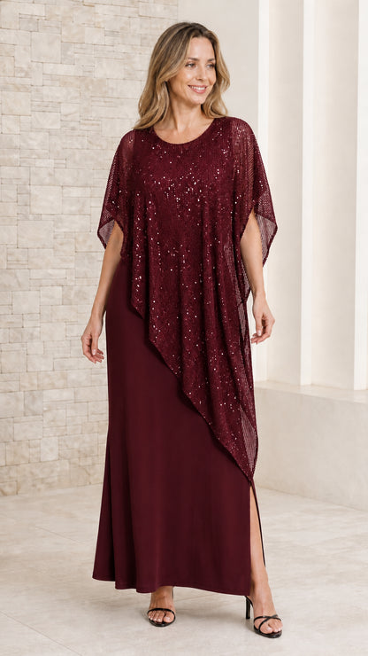 Front view of model in burgundy wine maxi dress with matching sequined capelet overlay