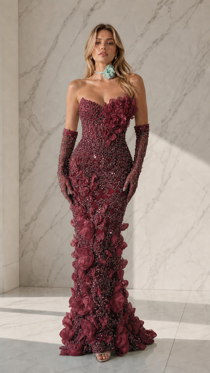 Rich burgundy formal gown with coordinating accessories