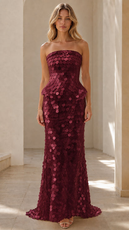 Front view of Burgundy strapless sequin peplum maxi dress