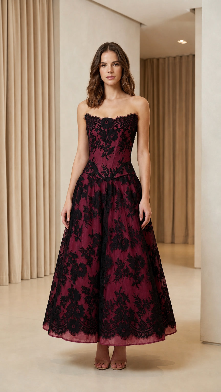 Model wearing burgundy color variant of lace corset midi dress