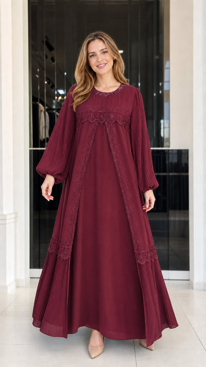 Front view of woman wearing burgundy wine red pleated sleeve lace maxi gown